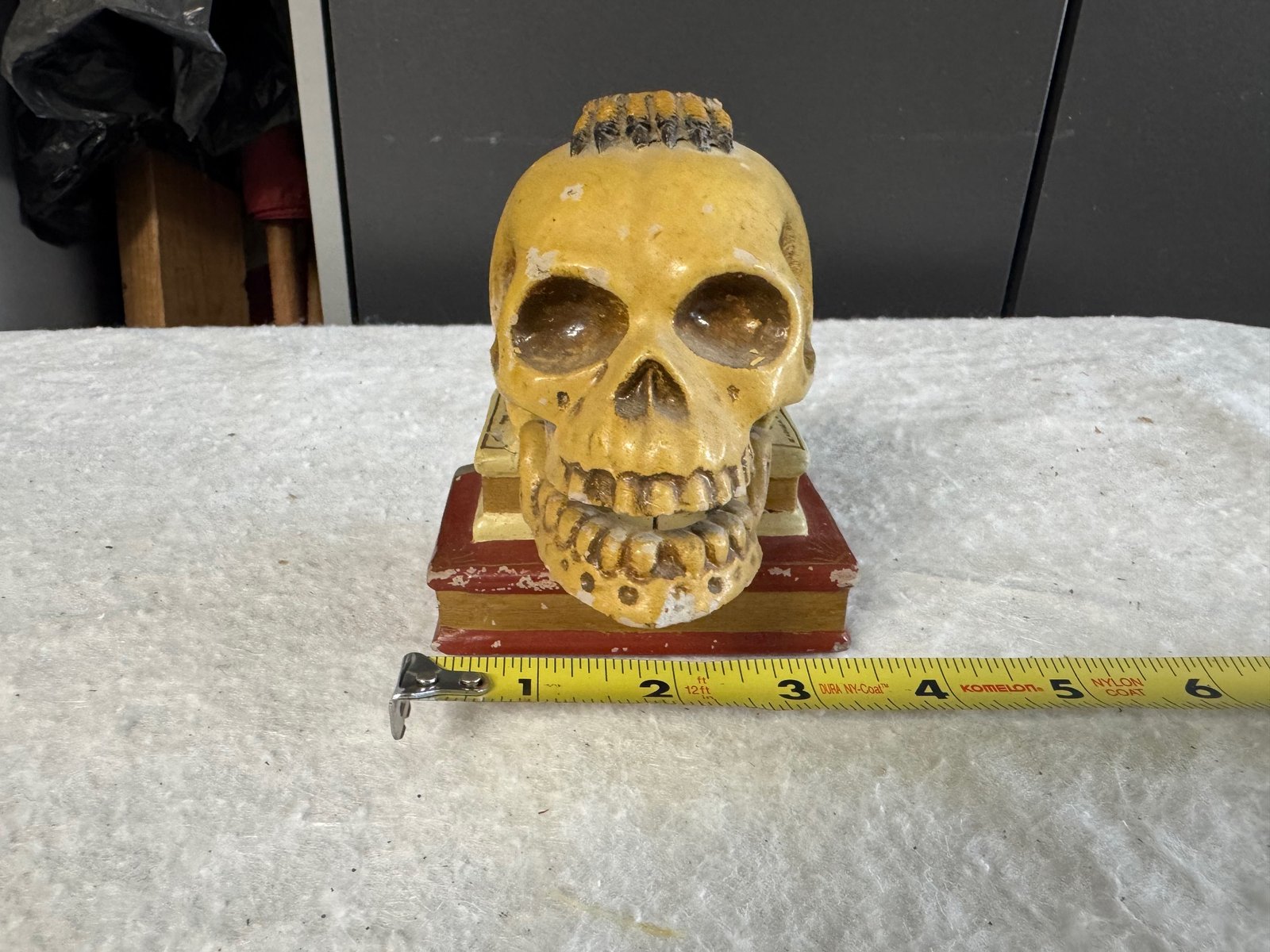 Skull on Books Figurine (lower jaw moves/bobs)