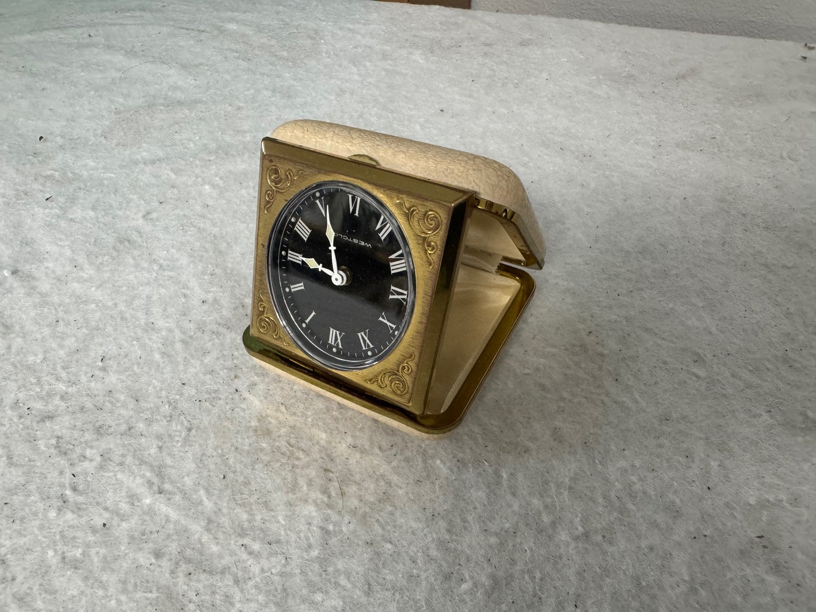 Small Gold Metal Clock in Leather Case