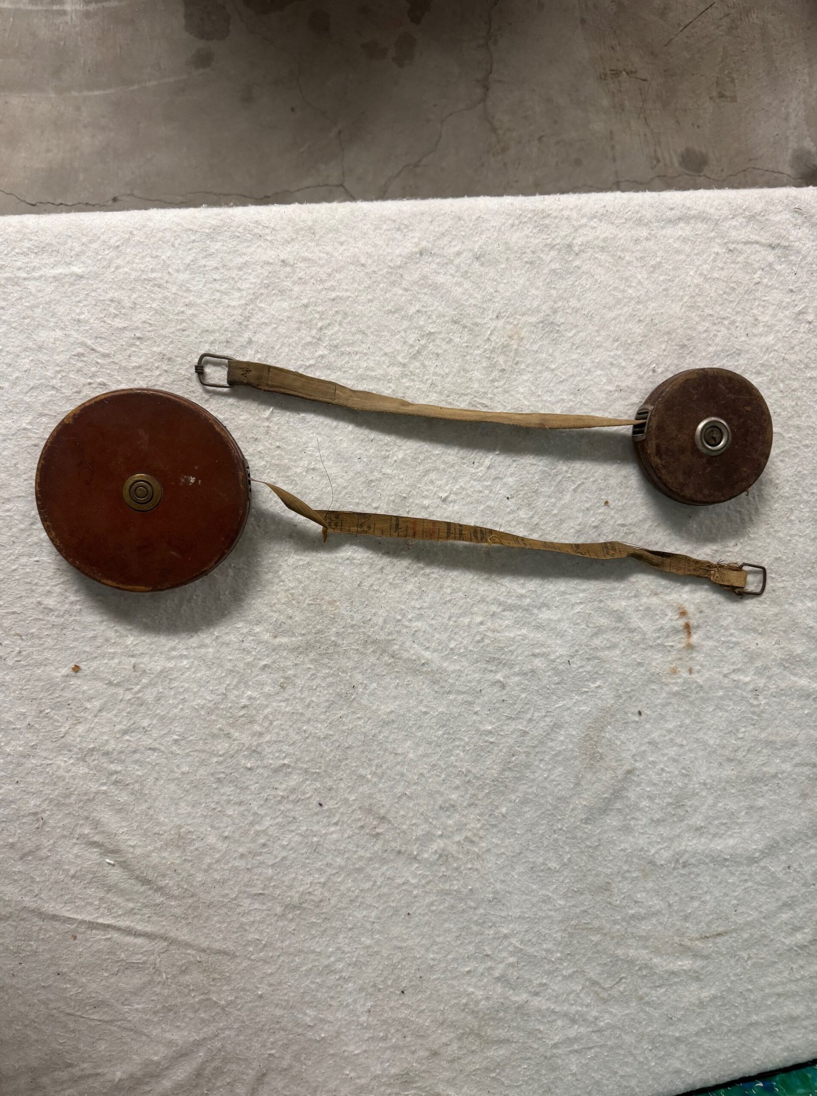 Antique Tape Measurers in Leather Wrapping (2 available)